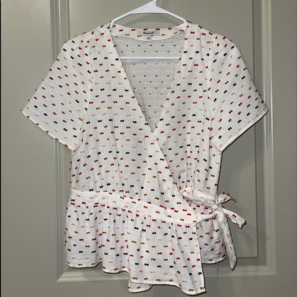 patterned v neck top that ties in the front